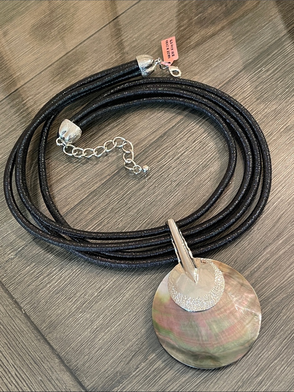 Multi-Strand Black Corded Necklace with Large Mother of Pearl Disc Pendant